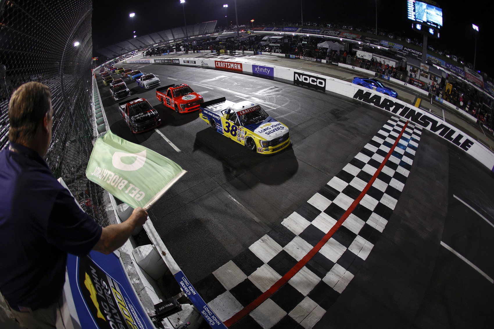 MARTINSVILLE, VIRGINIA - APRIL 14: Zane Smith, driver of the #38 Long John Silver's Ford, leads the field to the green flag to start the NASCAR Craftsman Truck Series Long John Silver's 200 at Martinsville Speedway on April 14, 2023 in Martinsville, Virginia.