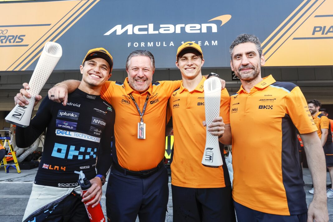 Lando Norris, McLaren, 2nd position, Zak Brown, CEO, McLaren Racing, Oscar Piastri, McLaren, 3rd position, and Andrea Stella, Team Principal, McLaren, celebrate after the race, F1