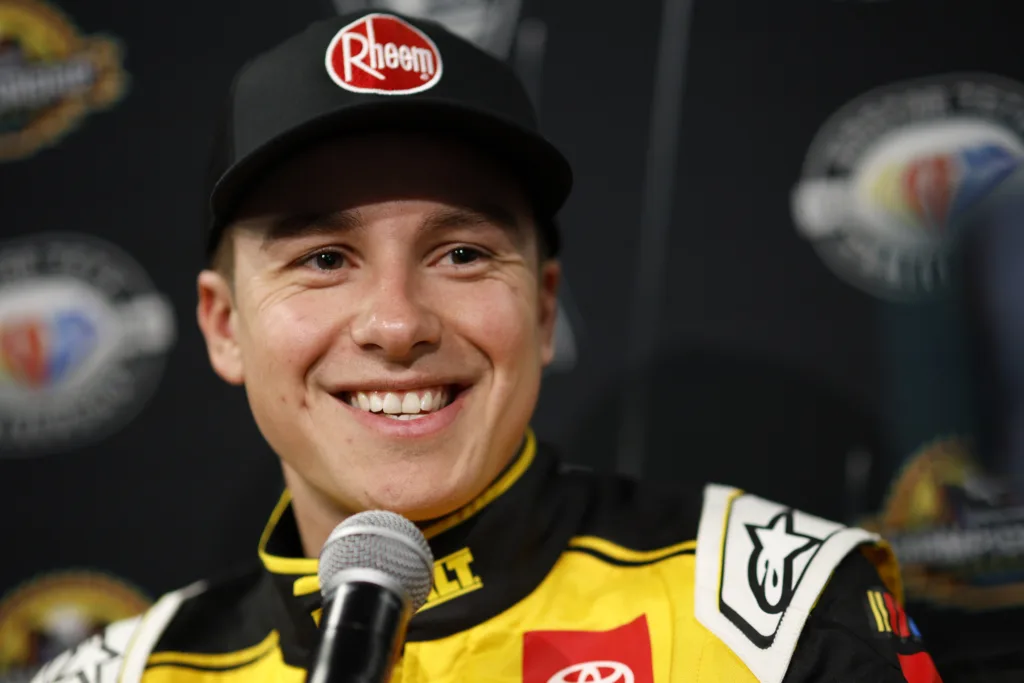 AVONDALE, ARIZONA - NOVEMBER 02: Christopher Bell, driver of the #20 DEWALT Toyota,  speaks to the media during the NASCAR Championship Media Day at Phoenix Raceway on November 02, 2023 in Avondale, Arizona