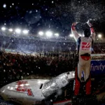 AVONDALE, ARIZONA - NOVEMBER 04: Cole Custer, driver of the #00 Haas Automation Ford, celebrates in victory lane after winning the NASCAR Xfinity Series Championship at Phoenix Raceway on November 04, 2023 in Avondale, Arizona