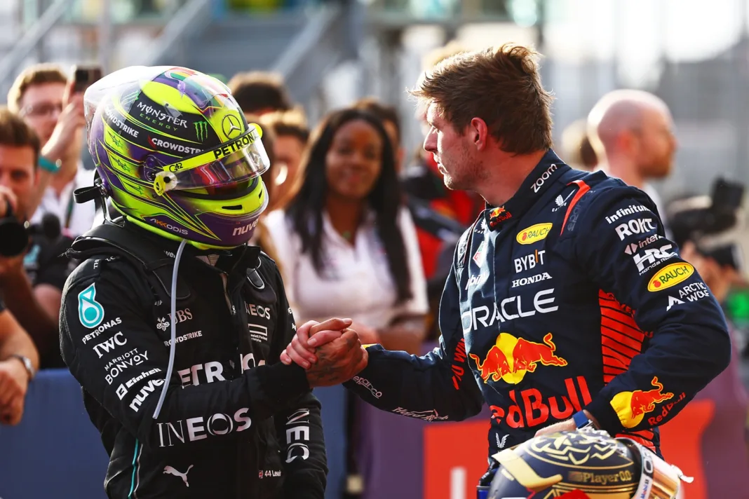 AUSTIN, TEXAS - OCTOBER 21: Sprint winner Max Verstappen of the Netherlands and Oracle Red Bull Racing shakes hands with Second placed Lewis Hamilton of Great Britain and Mercedes in parc ferme after the Sprint ahead of the F1 Grand Prix of United States at Circuit of The Americas on October 21, 2023 in Austin, Texas